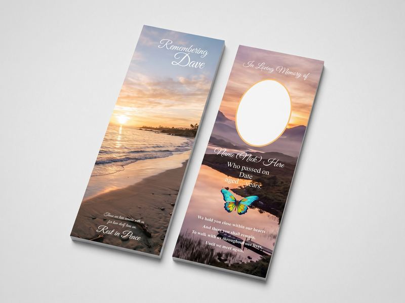 Two laminated memorial bookmarks, one with a sunset beach and one with a lake at dusk, showing the photograph oval, name, dates and verse